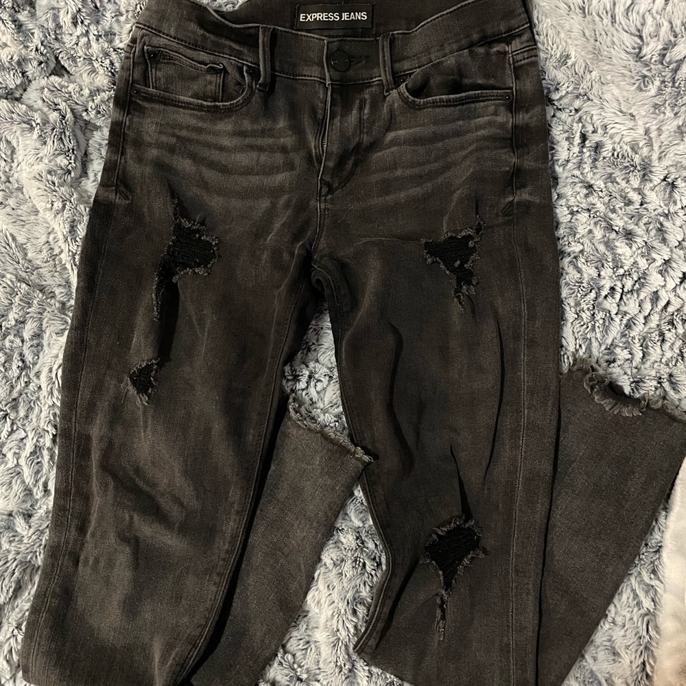 express jeans with wholes, mid rise, size 6